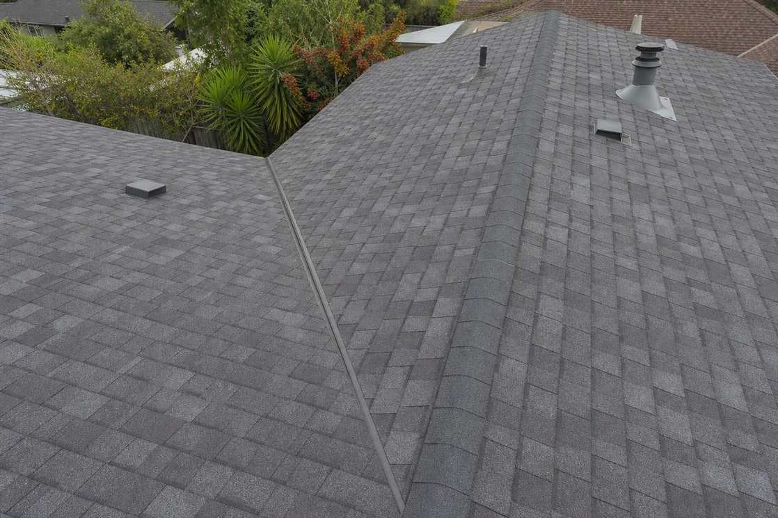 Architectural asphalt shingles across a finished sloped roof, shown near the beginning of the second half of the Pasadena residential roofing page.