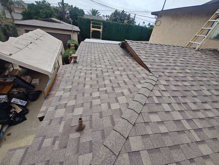 Multitone architectural-shingle roof planes, featured on the San Gabriel roofing page.