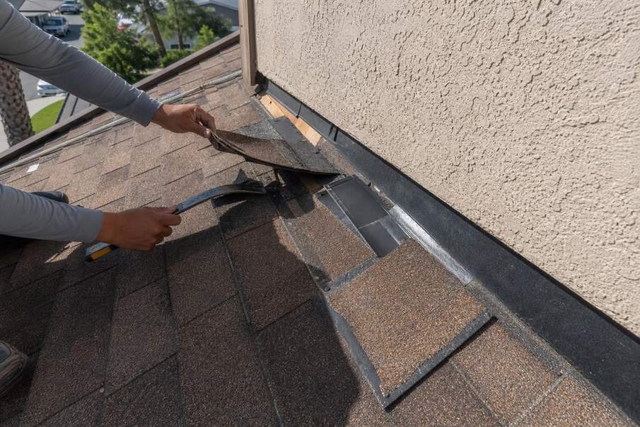 Flashing repair work at a roof transition, shown near the beginning of the second half of the Pasadena roof inspection page.