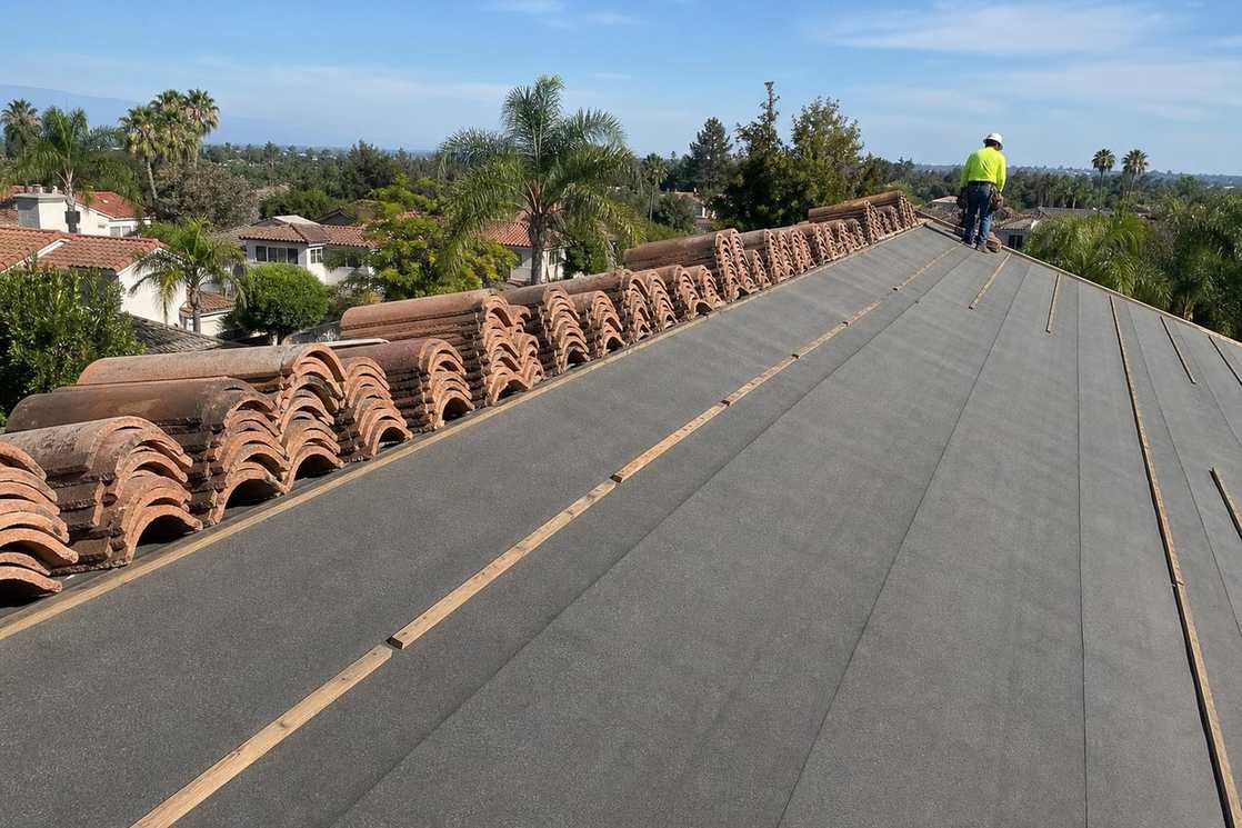 Roof underlayment exposed during tile roofing work, featured on the Pasadena tile underlayment replacement page.